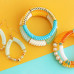 Acrylic Tube Twisted bead 33x8mm Transparent spectra yellow